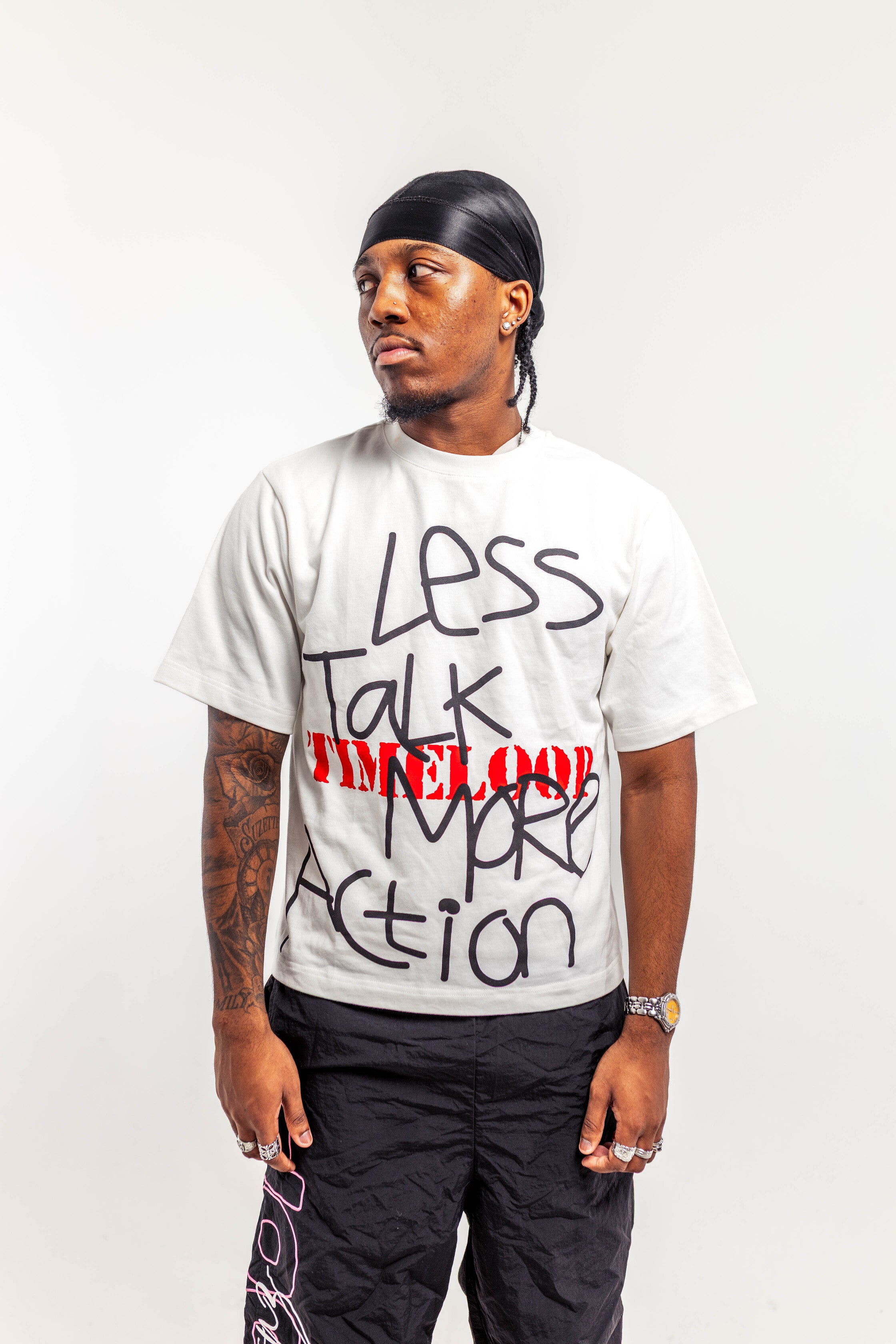 LESS TALK MORE ACTION TEE