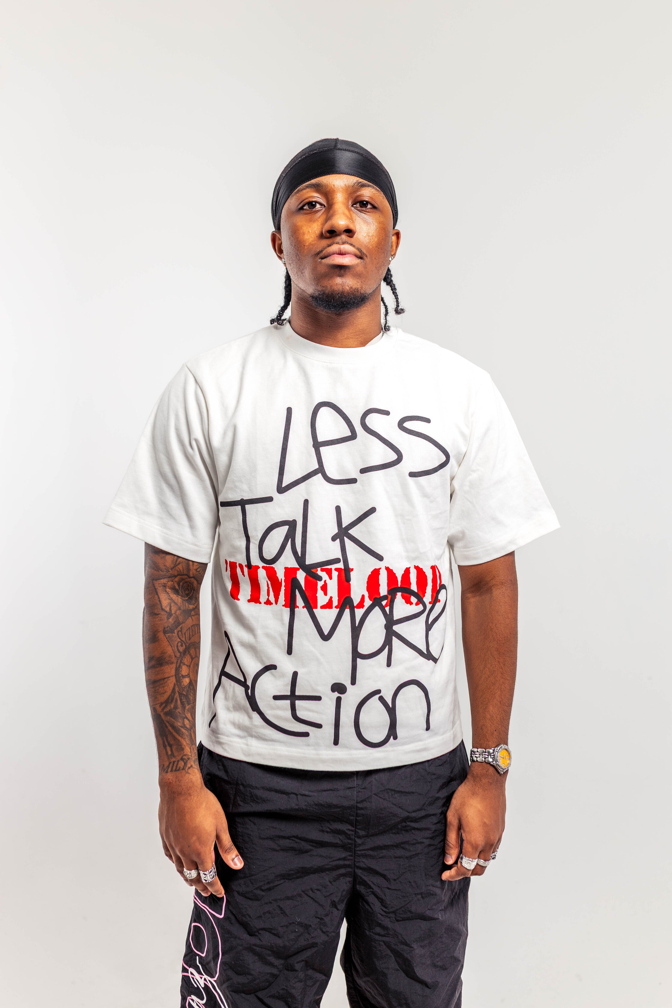 LESS TALK MORE ACTION TEE