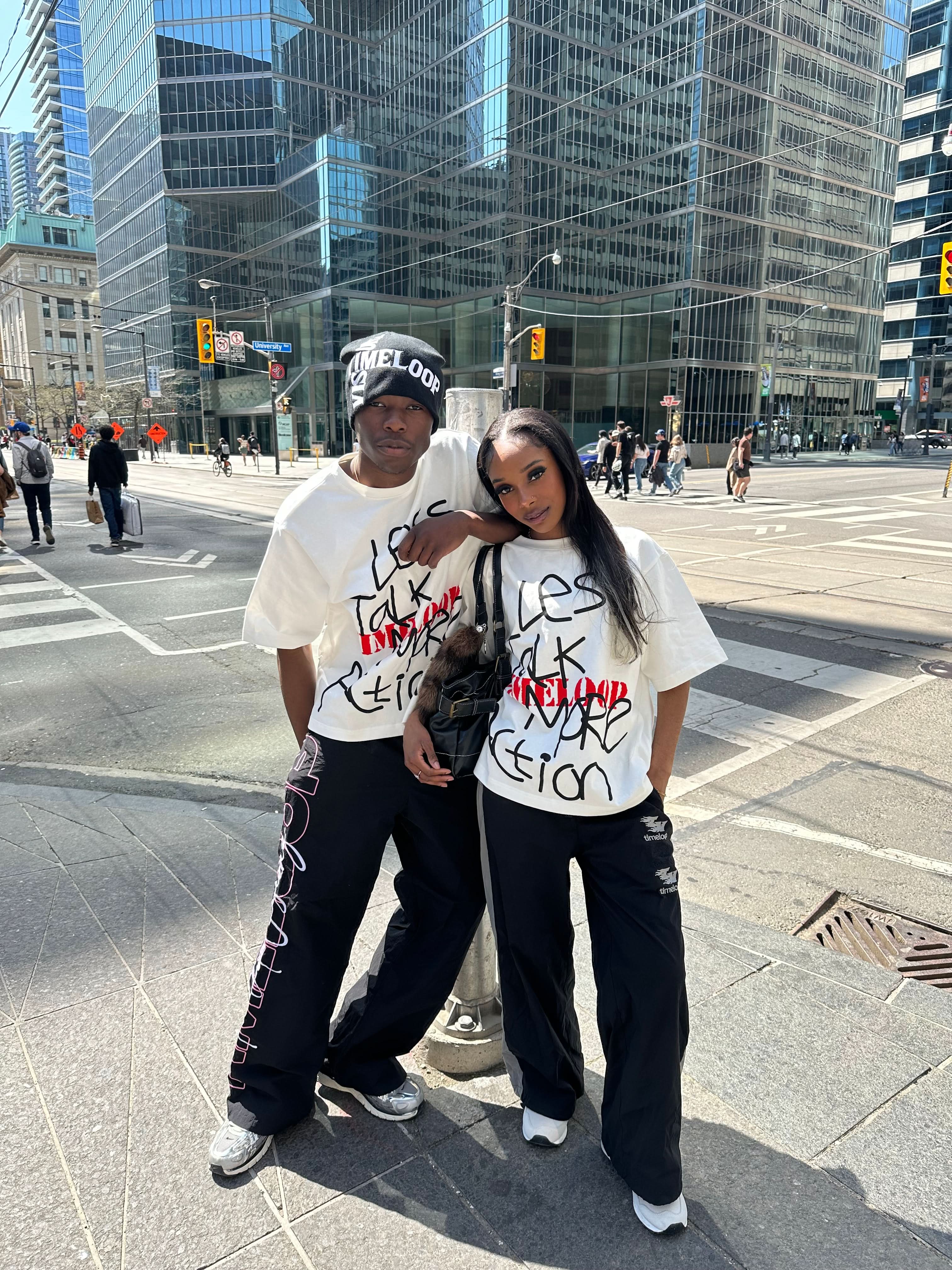 LESS TALK MORE ACTION TEE