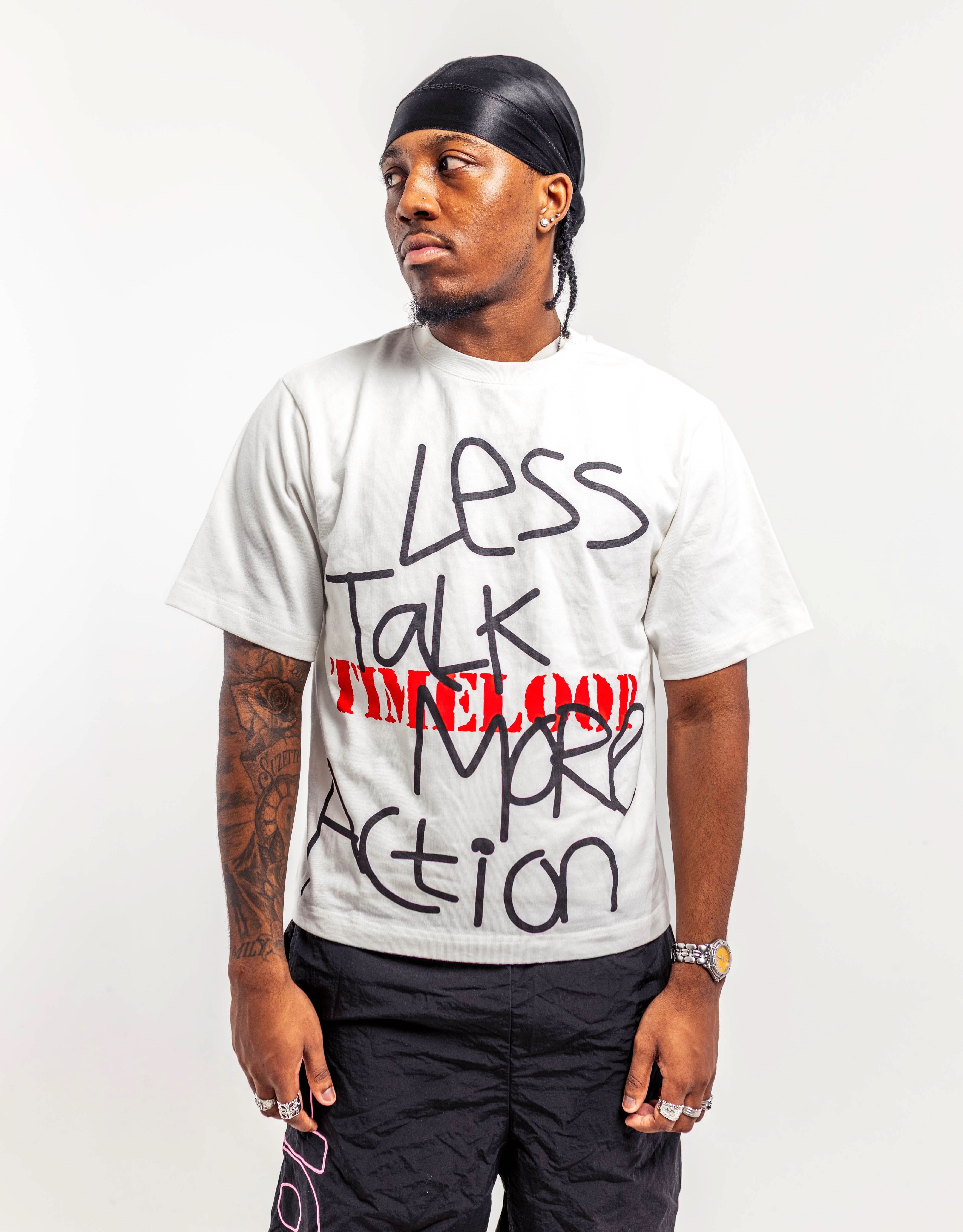 LESS TALK MORE ACTION TEE