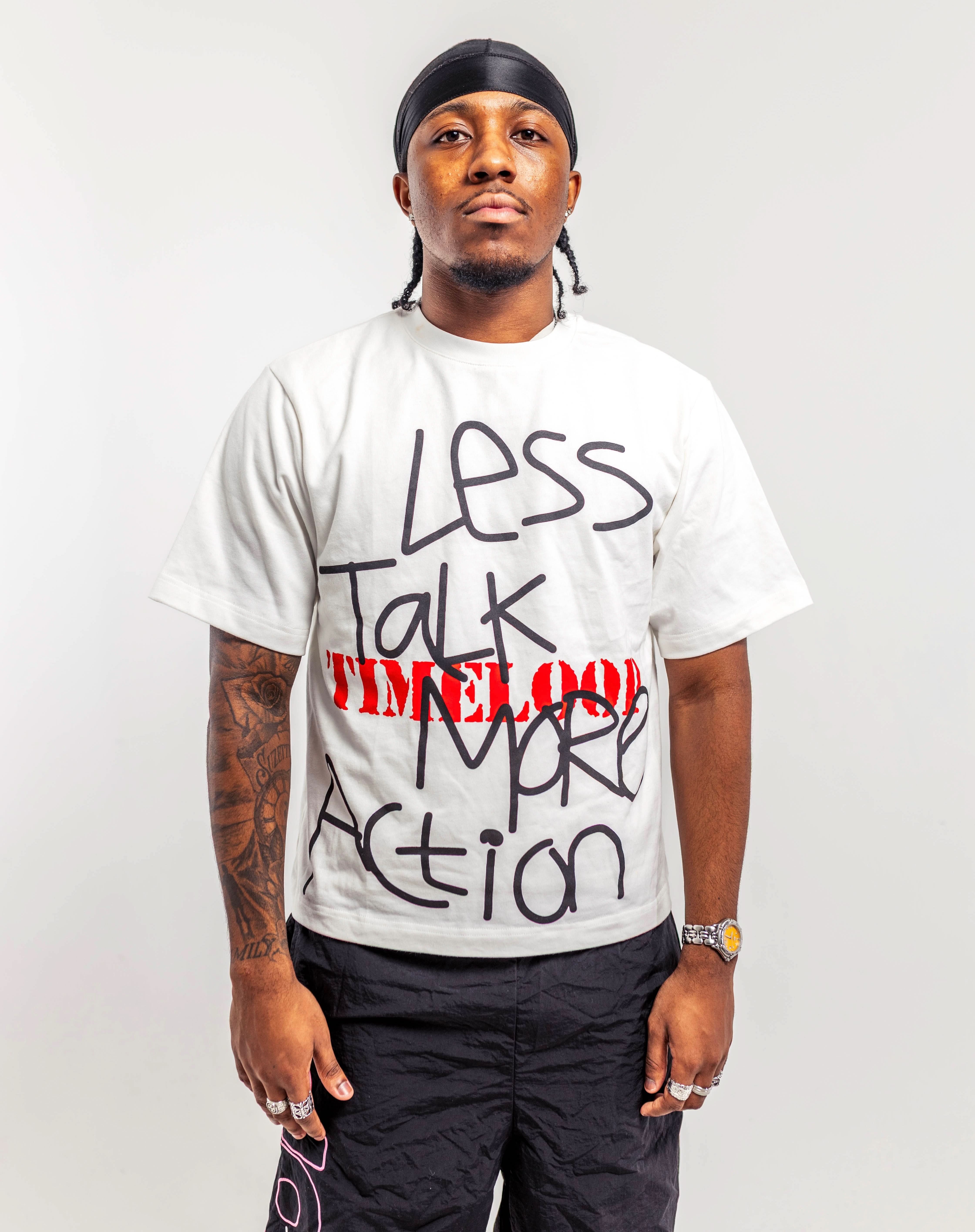 LESS TALK MORE ACTION TEE